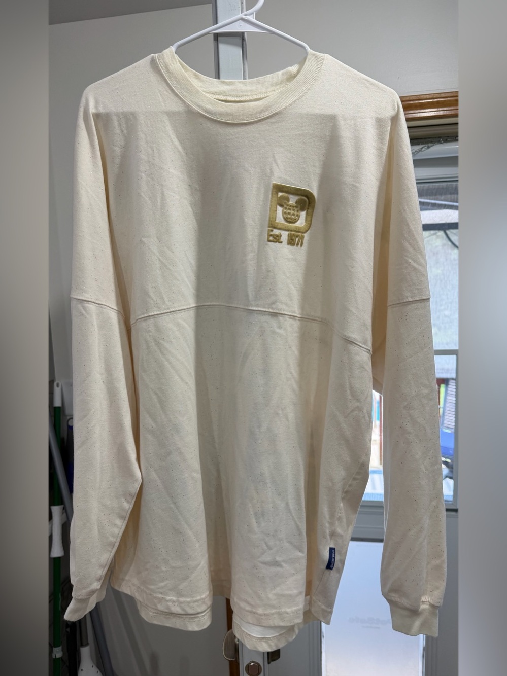 Disney 50th anniversary Cream Long Sleeve crewneck jersey with Embroidered Log